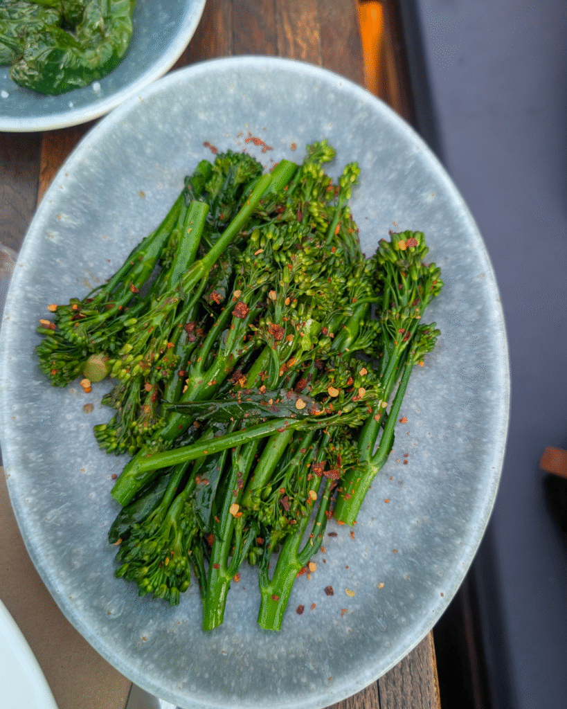 Steamed broccoli with mirin, soy sauce, garlic, and chilli flakes at Mate’s Restaurant.

